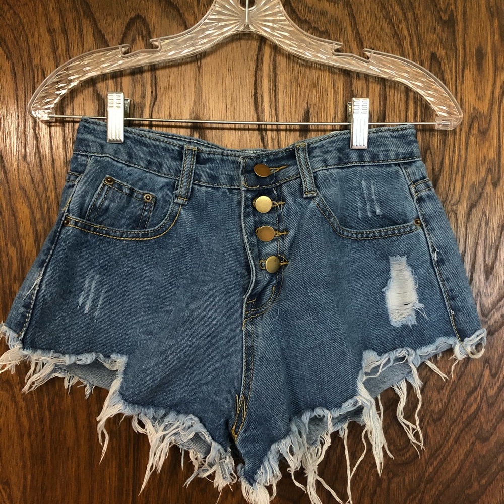 Ripped jean cutoff shorts